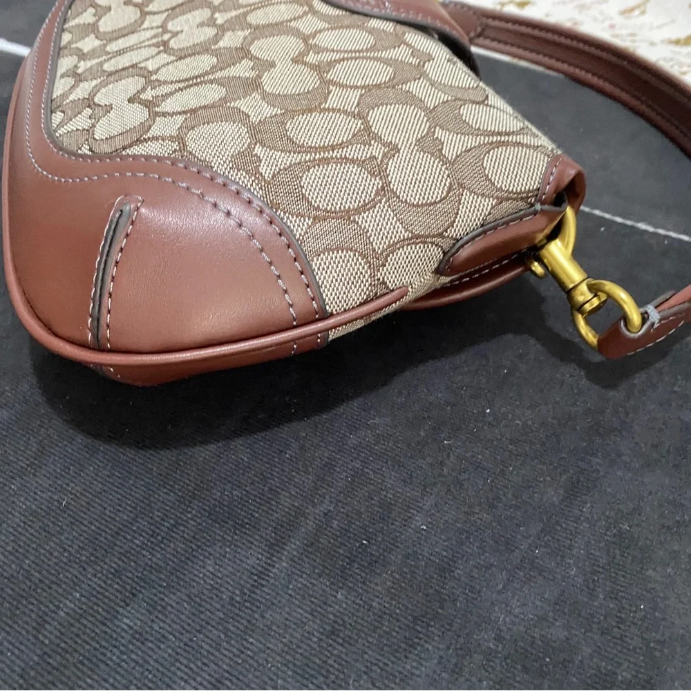 Coach Brown Signature Canvas Saddle Shoulder Bag with Gold Hardware